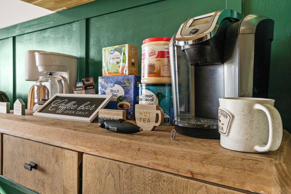 Enjoy coffee from our coffeemaker—perfect for early mornings or late-night work!