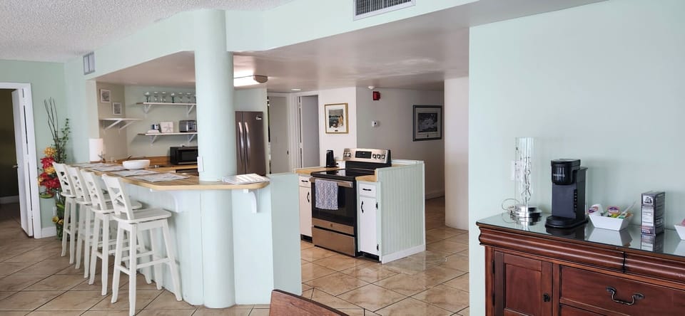 Open kitchen with views of the ocean!