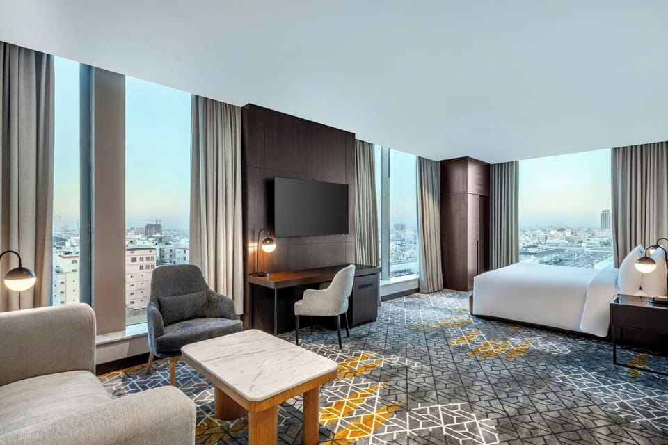 Junior Suite, 1 Bedroom, City View | In-room safe, individually decorated, individually furnished, desk