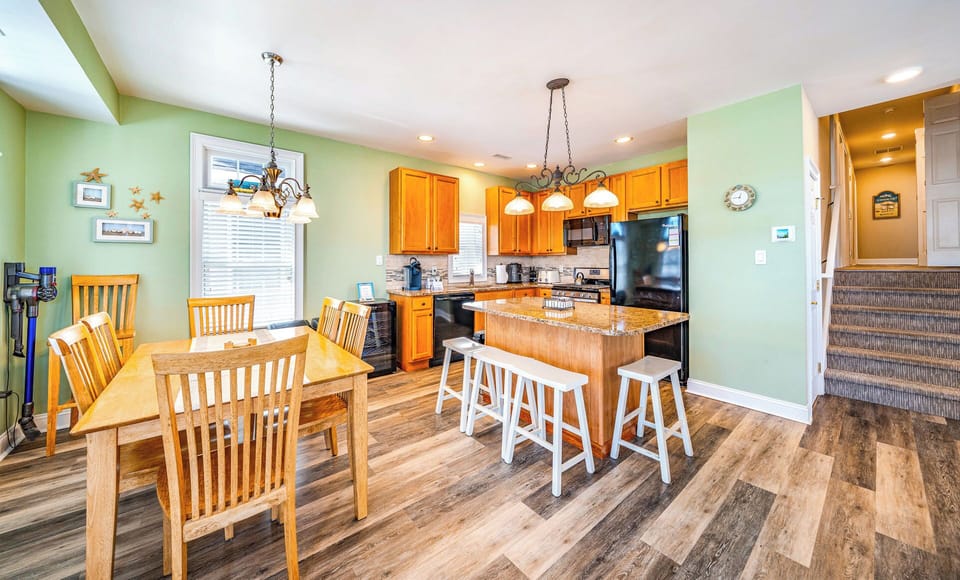 View of dining room area and kitchen area
