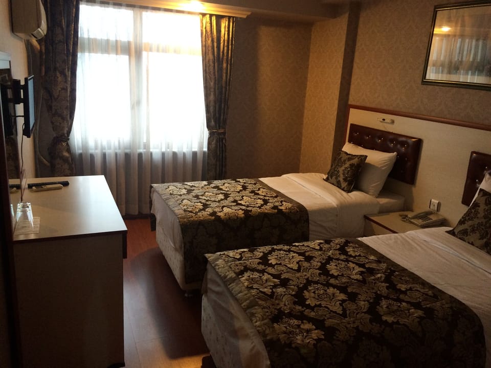 Select Comfort beds, minibar, in-room safe, desk