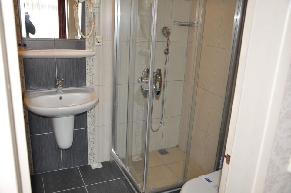 Separate tub and shower, deep soaking tub, hair dryer, slippers