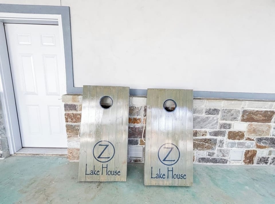 Z Lakehouse Corn Hole--Bean Bags and additional yard games can be found in the bottom downstairs bunk bedroom!