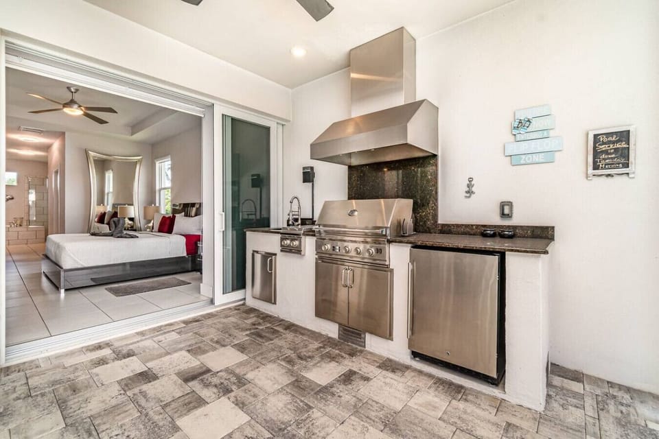 Efficient studio layout with modern kitchenette, opening into a cozy sleeping area.