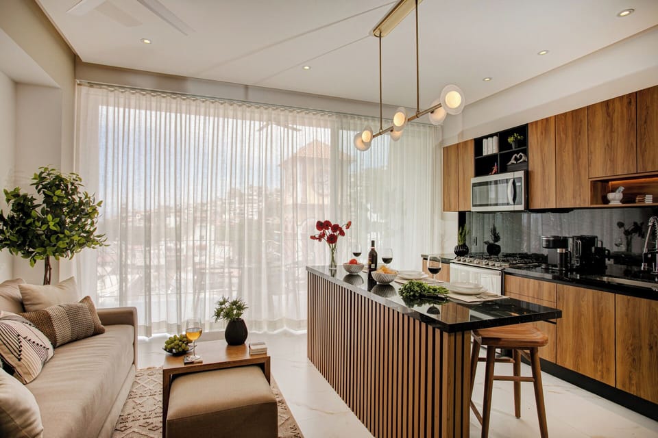 Equipped with both sheer light reducing curtains and blackout shades for privacy and comfort.