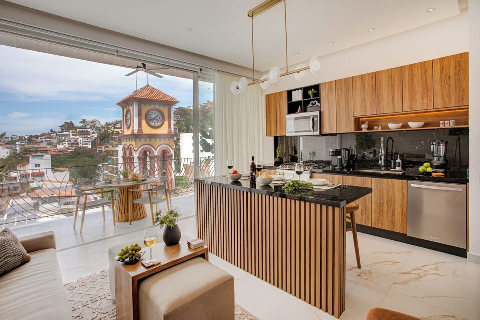 Open and airy kitchen and living area for entertaining or relaxation.