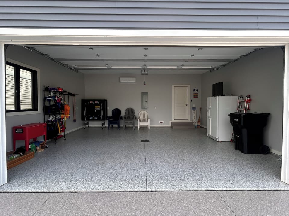 2 car garage has a second fridge, ping pong table, firepit chairs, life jackets
