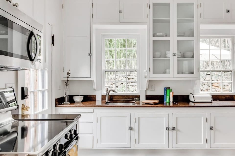Kitchen: Bright and airy with modern appliances and charming views—perfect for culinary adventures!
