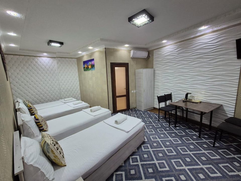 Quadruple Room | Soundproofing, iron/ironing board (on request)