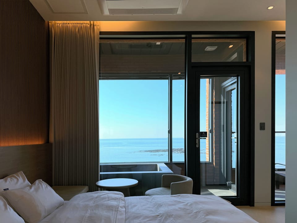 Egyptian cotton sheets, premium bedding, down comforters, free minibar