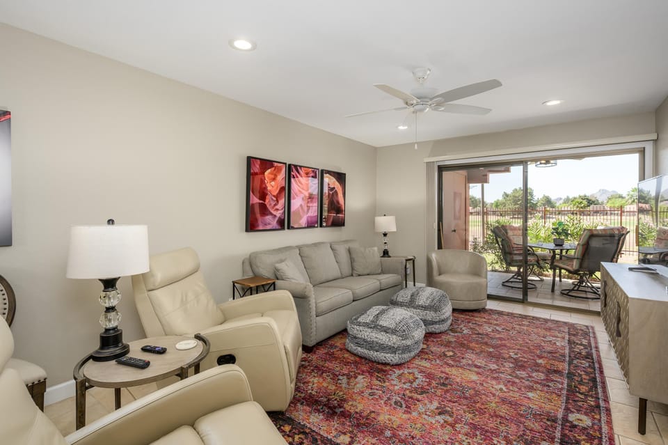 Dual recliners as well as couch and an additional chair for guests.
