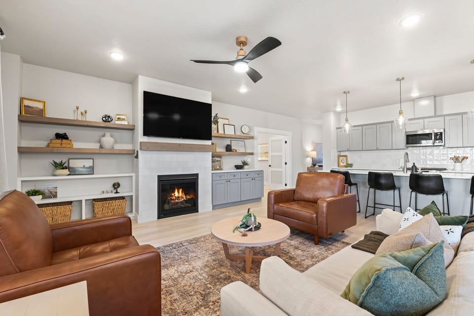 Enjoy an open floor plan that connects the living room to the kitchen and dining room with space for everyone to lounge.
