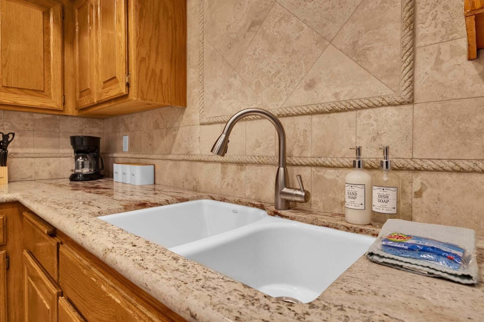 Kitchen prep area with coffee station and ample counter space
