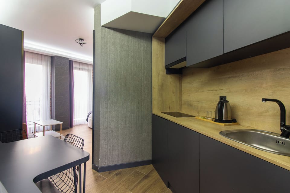 Superior Room, Hot Tub | Private kitchen | Mini-fridge, stovetop, electric kettle, cookware/dishes/utensils