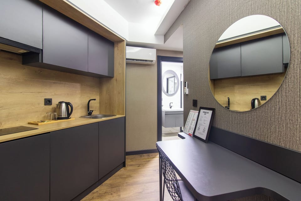 Superior Room, Hot Tub | Private kitchen | Mini-fridge, stovetop, electric kettle, cookware/dishes/utensils