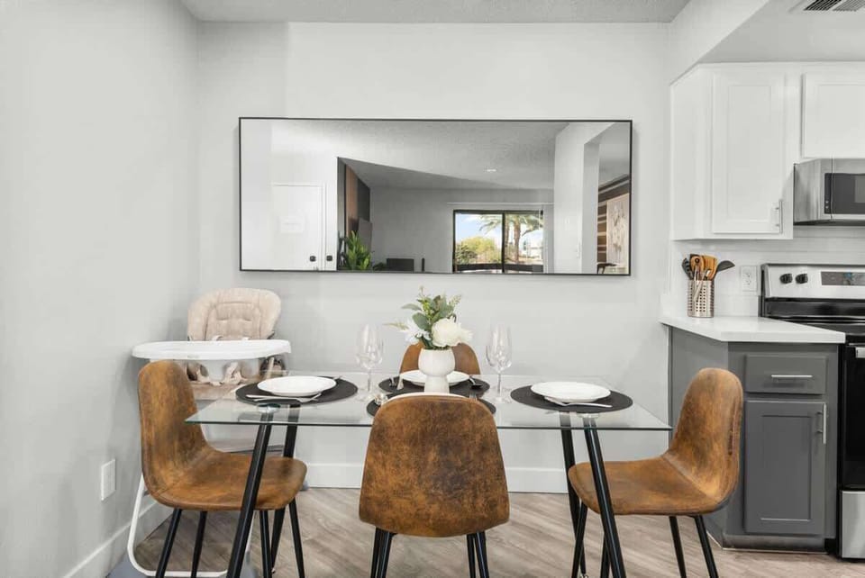 Dining area (seats 4), high chair and fully-functional kitchenette with basic cooking ware