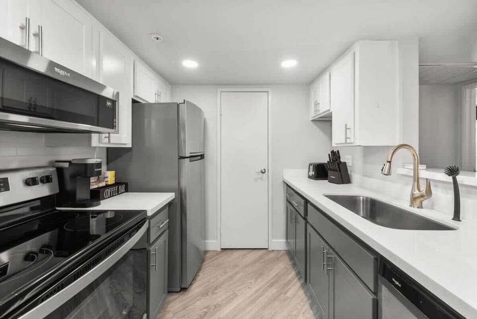Modern, fully functional kitchen with basic cooking ware