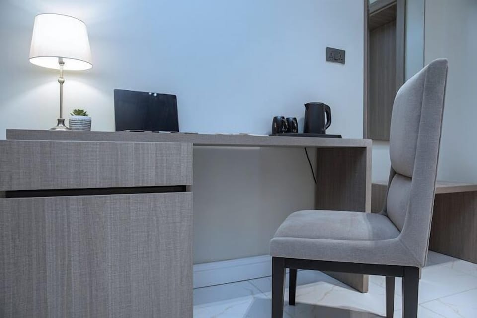 Deluxe Apartment, Balcony, City View | 1 bedroom, desk, laptop workspace, blackout drapes
