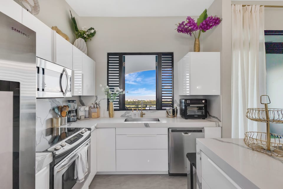 Kitchen with modern appliances and modern finishes