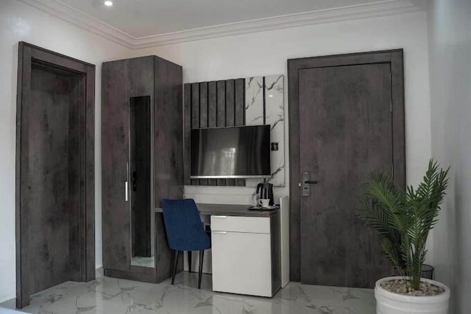Family Apartment, Balcony, City View | 1 bedroom, desk, laptop workspace, blackout drapes