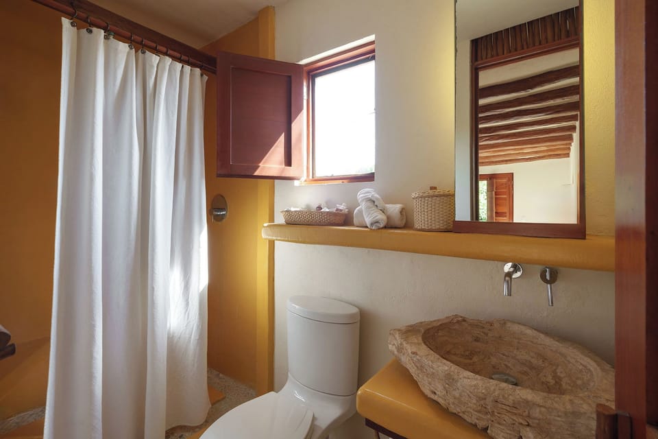 Shower, rainfall showerhead, hair dryer, towels