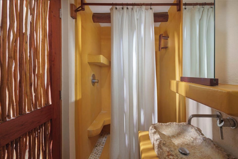 Shower, rainfall showerhead, hair dryer, towels