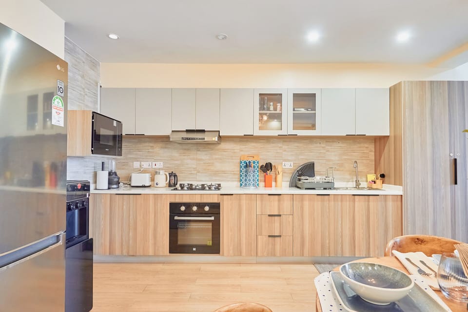 Superior Apartment, 2 Bedrooms, Balcony, City View | Private kitchen | Full-size fridge, microwave, oven, stovetop