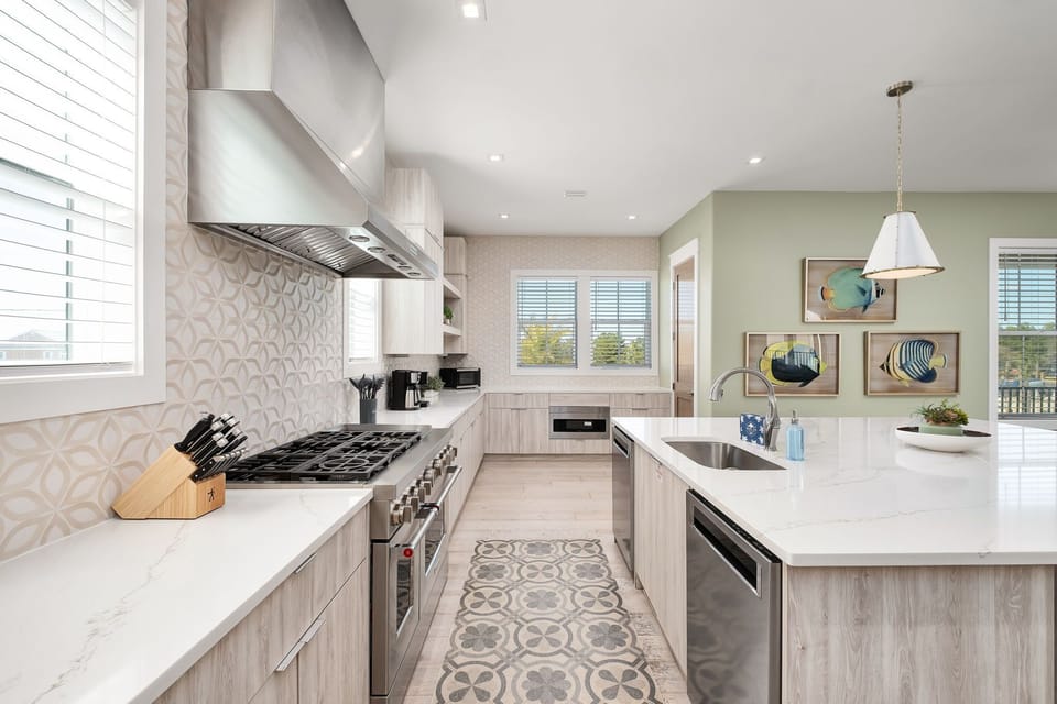 The kitchen is equipped with various appliances for a variety of cooking needs.