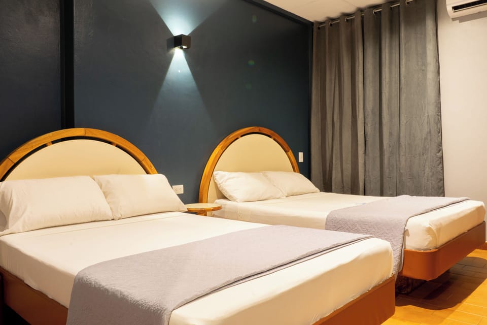Quadruple Room | Premium bedding, down comforters, memory foam beds