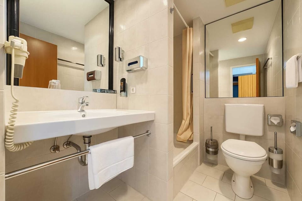 Hair dryer, towels, soap, shampoo