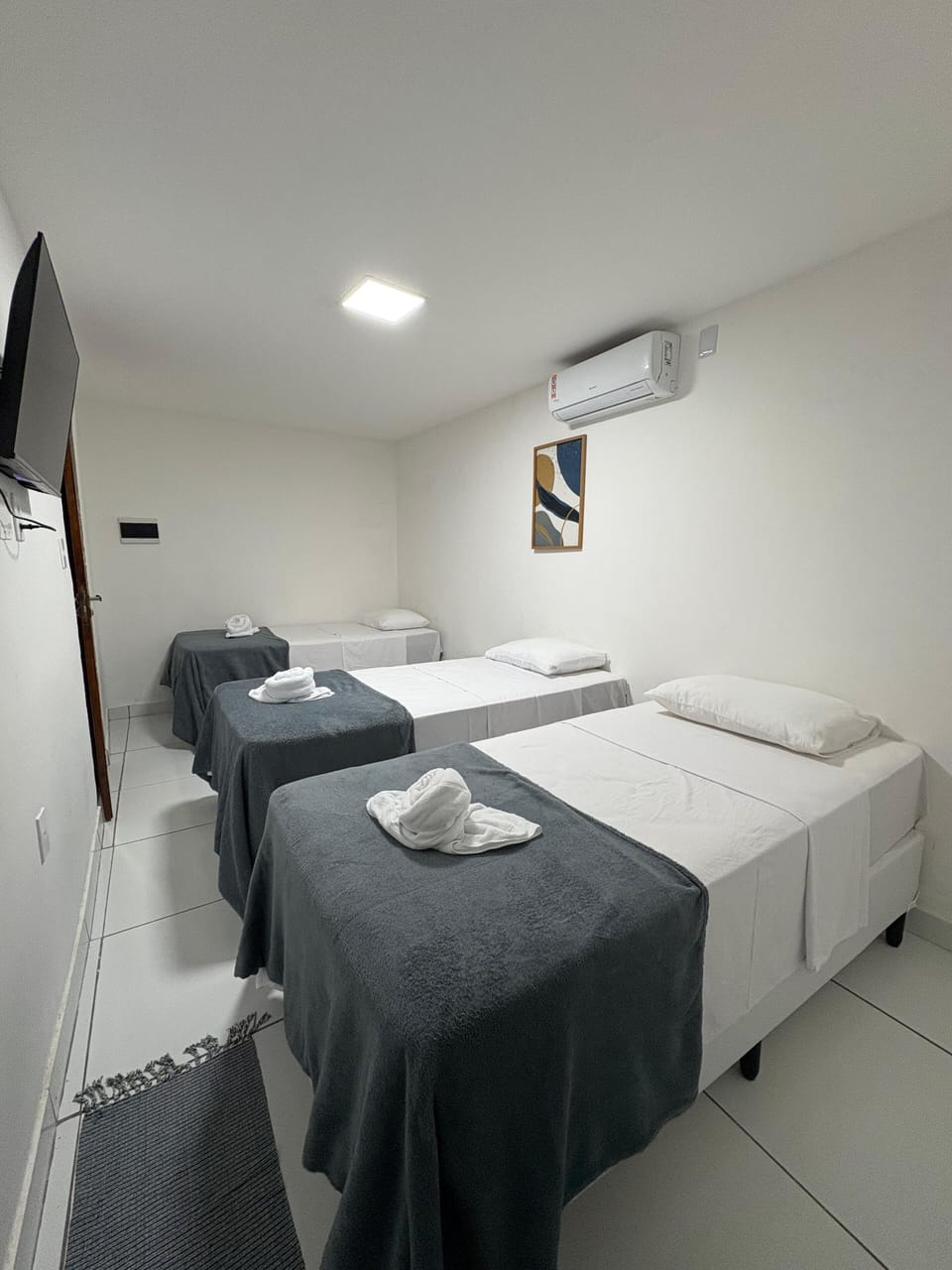 Standard Triple Room | Iron/ironing board, free WiFi, bed sheets
