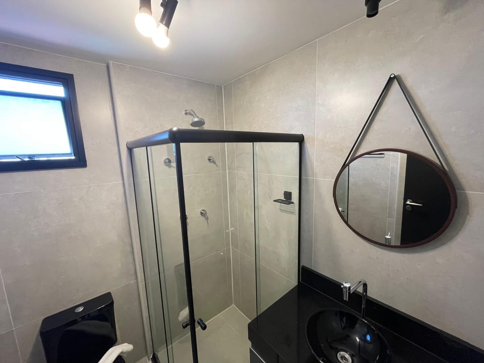 Apartment, City View | Bathroom | Shower, hair dryer, towels, toilet paper