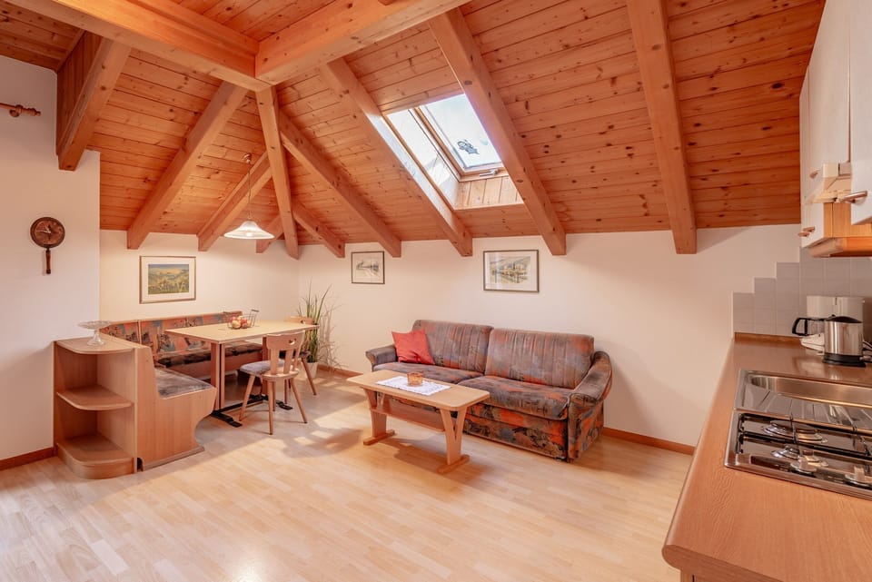 A bright living room under the rafters