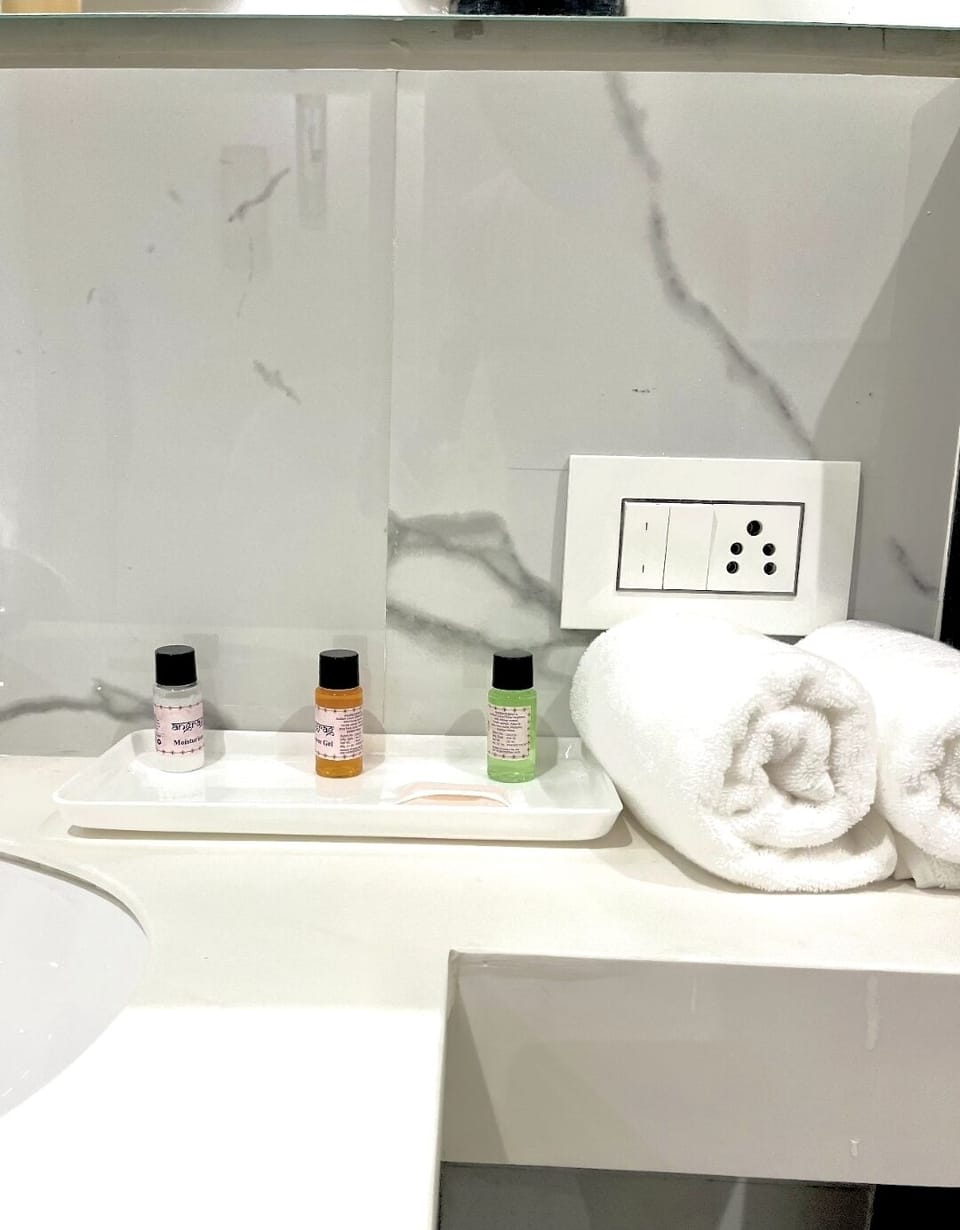 Deluxe Apartment, City View | Bathroom | Shower, soap, toilet paper