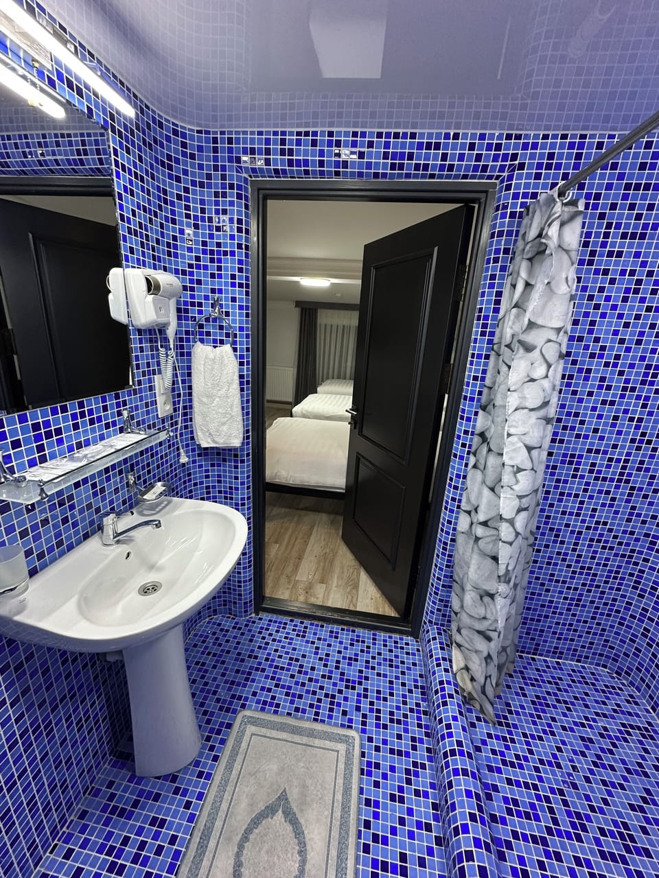 Standard Triple Room, City View | Bathroom | Shower, hair dryer, slippers, towels