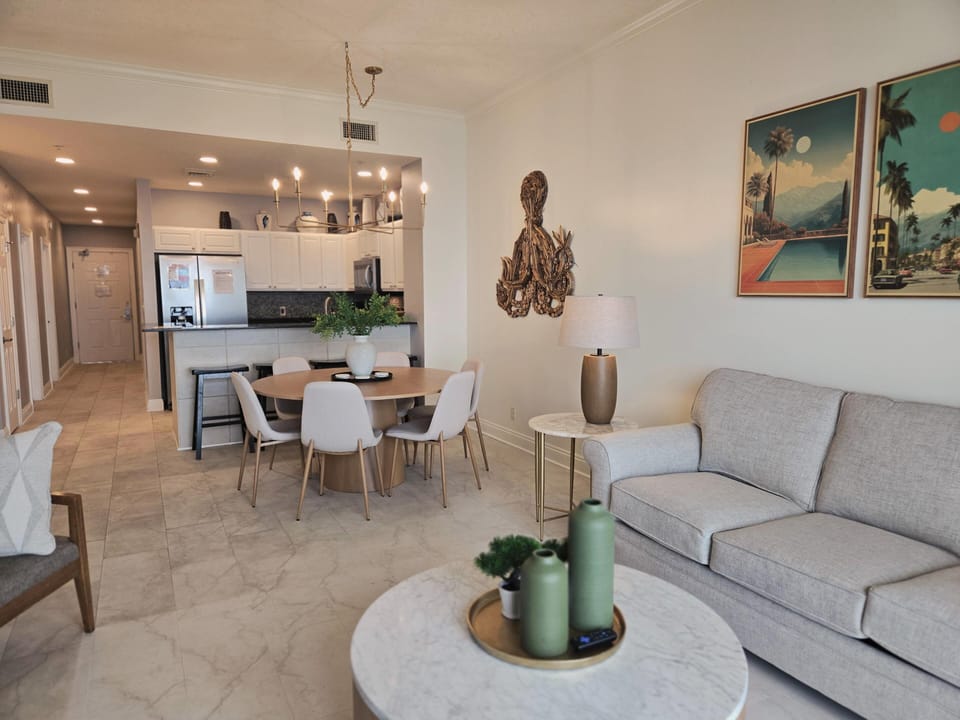 Bright open living and dining area with modern kitchen