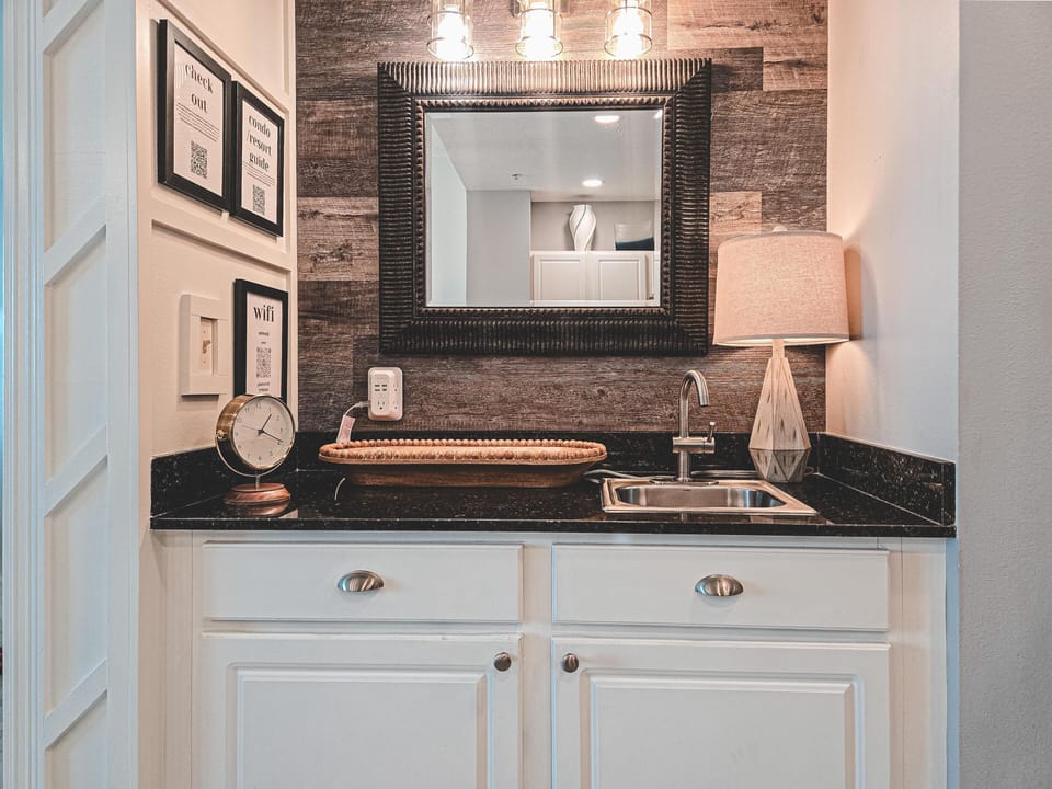 Cozy bathroom retreat with rustic wood accent wall and elegant lighting