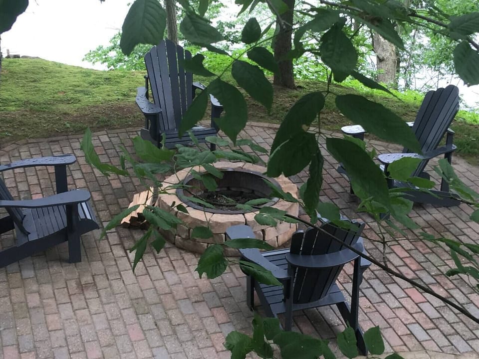Firepit at each cottage with seating