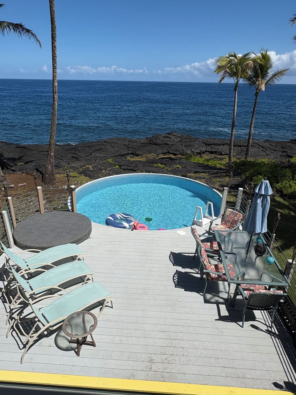 The pool deck and your view from the upper lanai and bedrooms