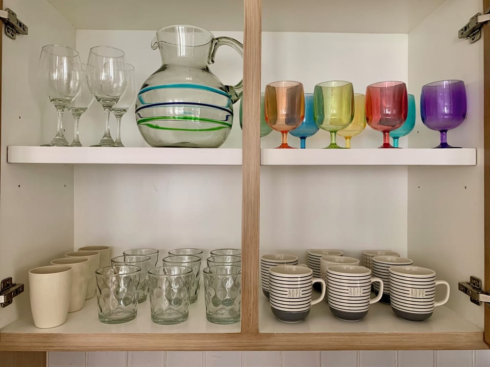 Thoughtfully organized cupboards with all the essentials within reach.