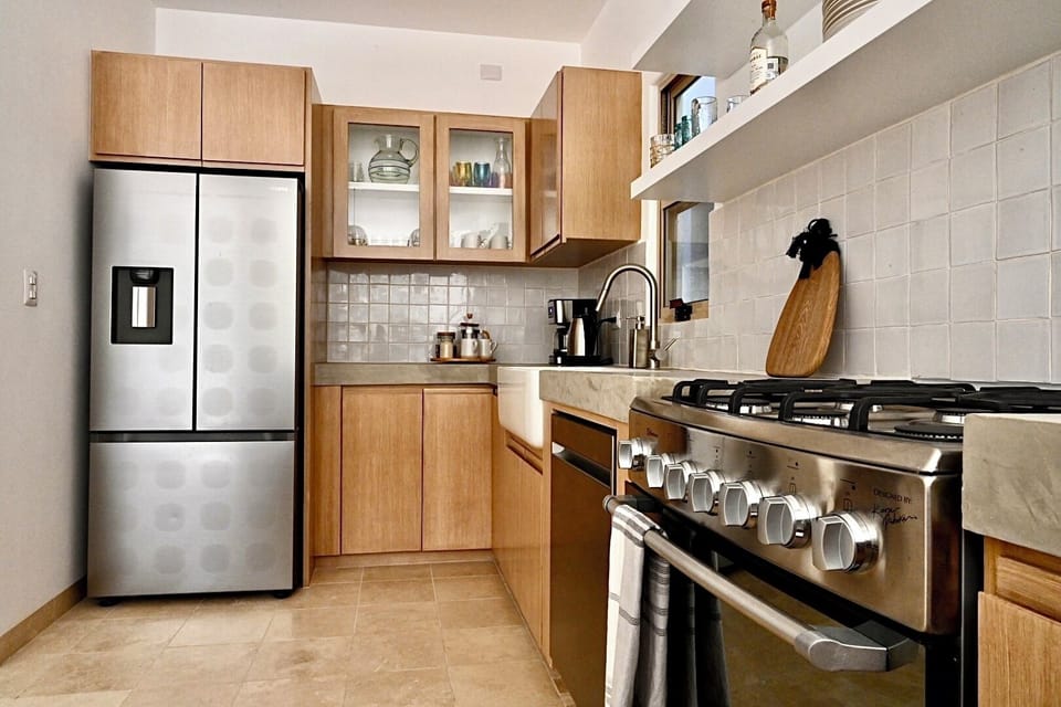 Kitchen is bright, modern, and fully equipped.