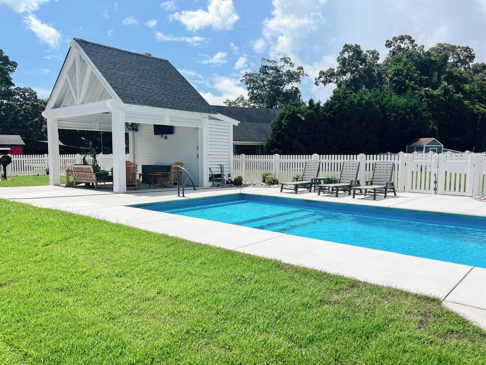 New for 2025 - In ground pool with covered lounge & outdoor TV