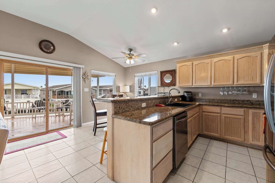 Cook with a view from the open granite kitchen