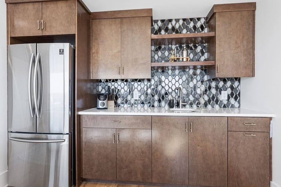 Rooftop floor has a full bath, elevator access, kitchenette, daybed with pullout trundle bed (sized XL twin).

4th floor outdoor roof-deck is half covered with an 85" flatscreen TV, fire pit, 2 heaters, electric smoker, dining room, & view finder.