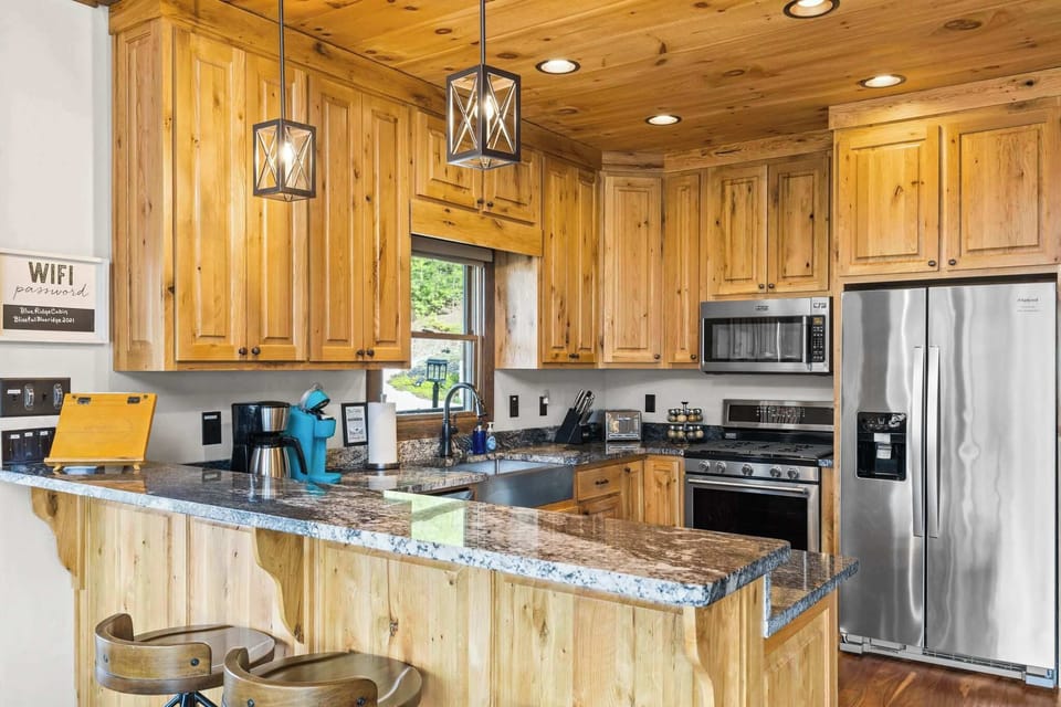 Features high-end appliances and a spacious island—perfect for cooking, dining, and making memories.