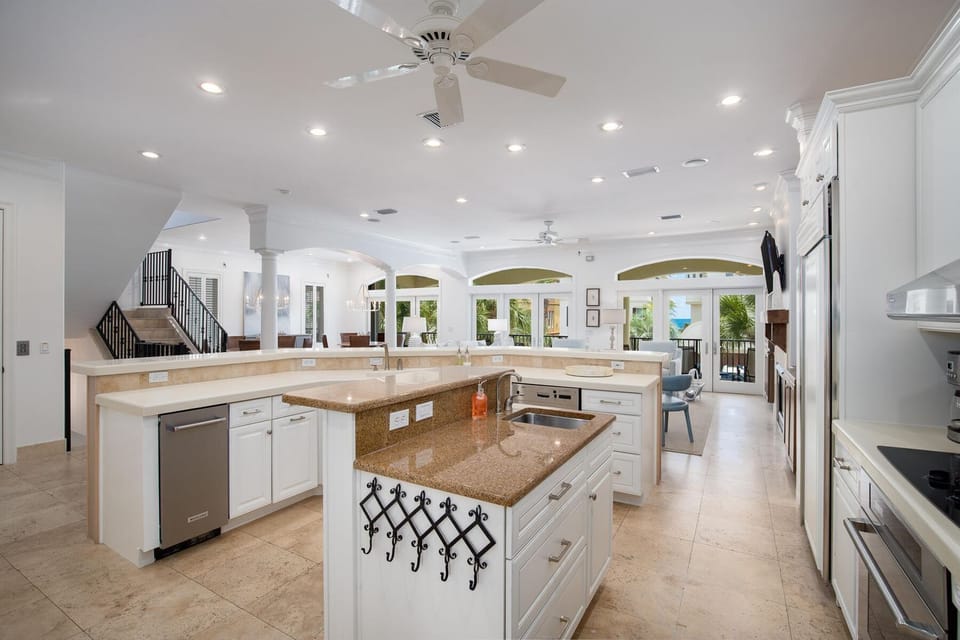 Your gourmet kitchen features granite countertops, stainless steel appliances, and spacious island perfect for cooking memorable meals together.