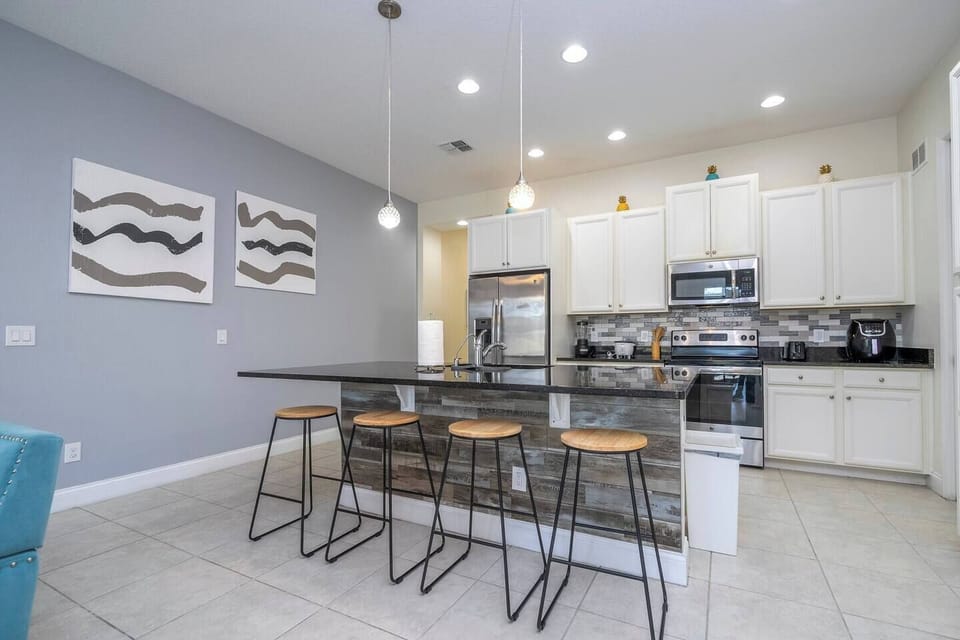Enjoy the convenience of a fully equipped kitchen, perfect for preparing meals during your stay.