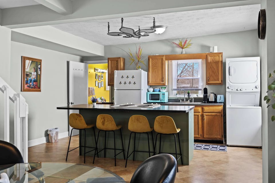 Kitchen: This home features a spacious kitchen- perfect for creating home-cooked meals!