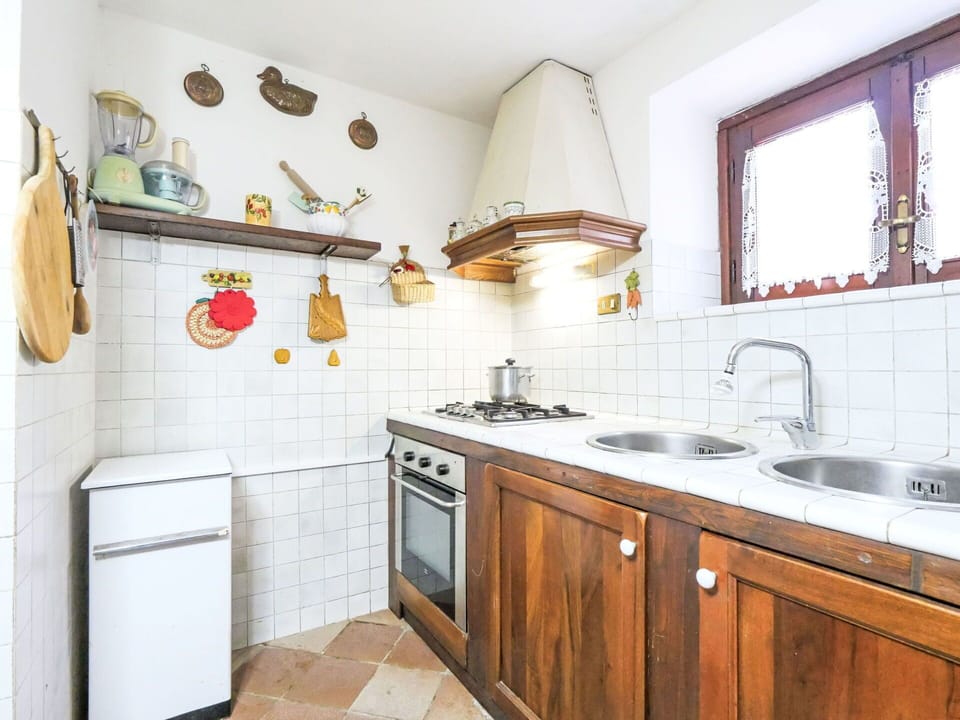 Kitchen, Wood, Interior Design, Flooring, Countertop, Major Appliance, Kitchen Appliance, Room, Ceiling, Floor