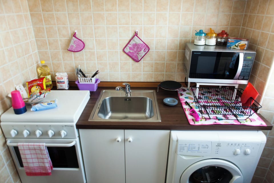 Condo, City View | Private kitchen | Electric kettle, toaster